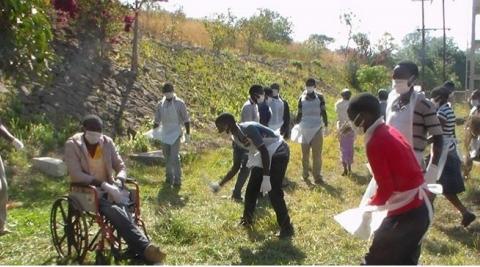 Volunteers help to clean up their local hospital in Malawi