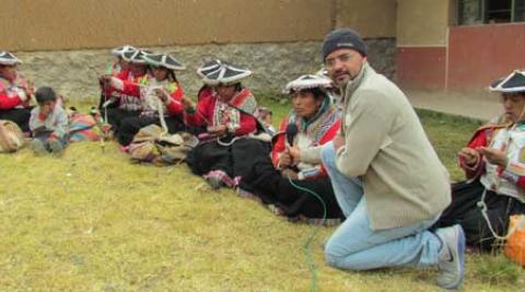 Alberto Vasquez interviews women in Pitumarca, Peru