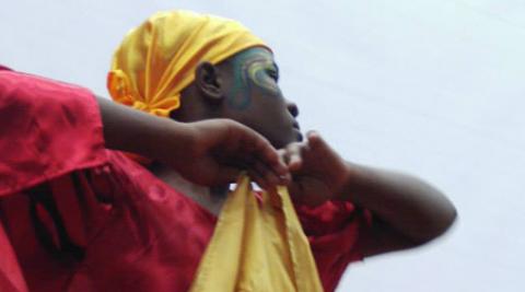 A member of the dance group Ayika performs