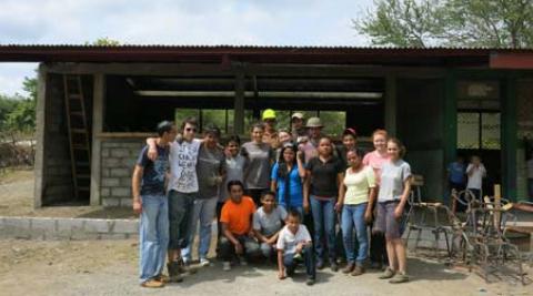 Team outside the finished classroom