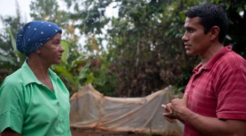 Amparo Jimenez and Bernardo Lopez in food garden