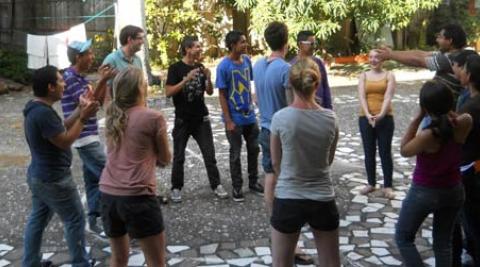 ICS Progressio volunteers talking in courtyard