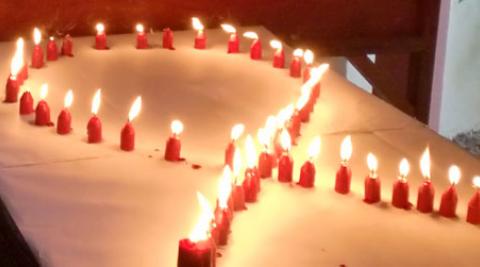 A display of candles at the Estrela+ Christmas party