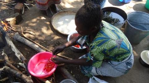 A woman preparing food in Malawi