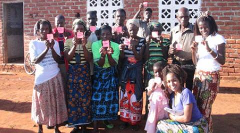 Group members pose with their confidence cards