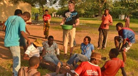 UK volunteer Michael with the bucket game