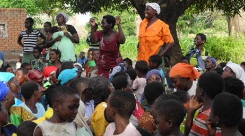 Women and children celebrate tree planting