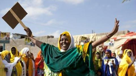 Woman campaigning ahead of local elections in November 2012