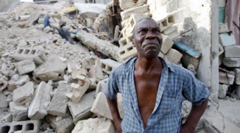 wilbert joseph surveys the rubble of his former home