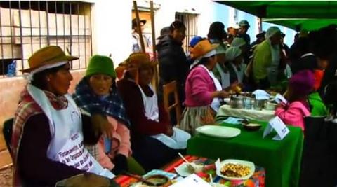 Women at a food fair in Huancavelica, Peru