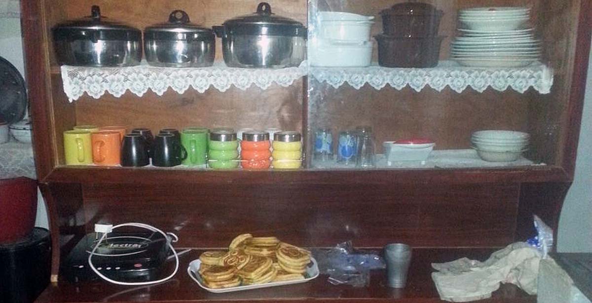 Cupboard with kitchen utensils