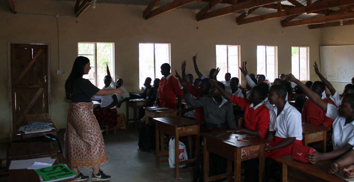 Tara eliciting answers from students at Edinburgh All-Girls School