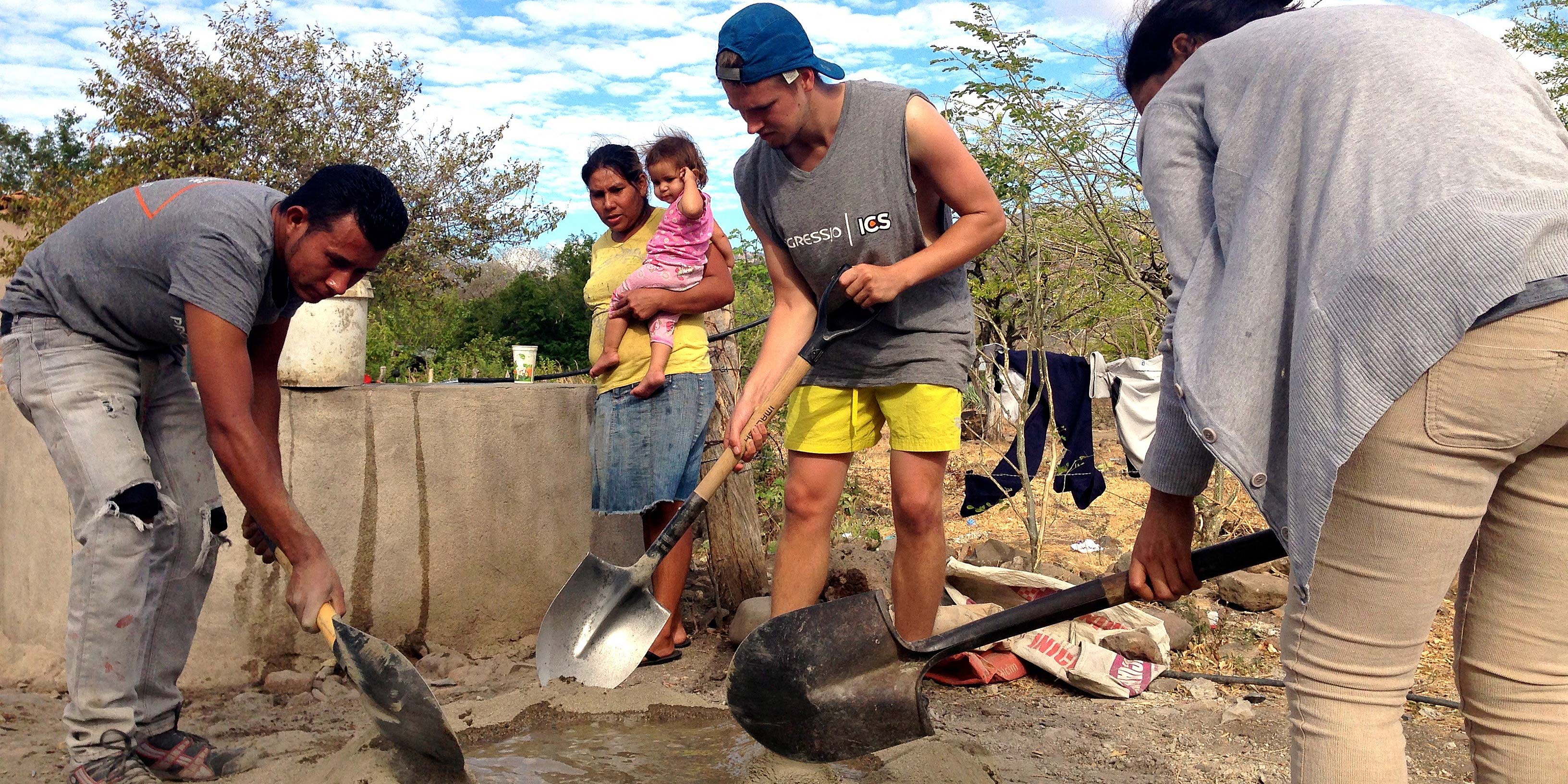 Mixing cement for our first eco-stove